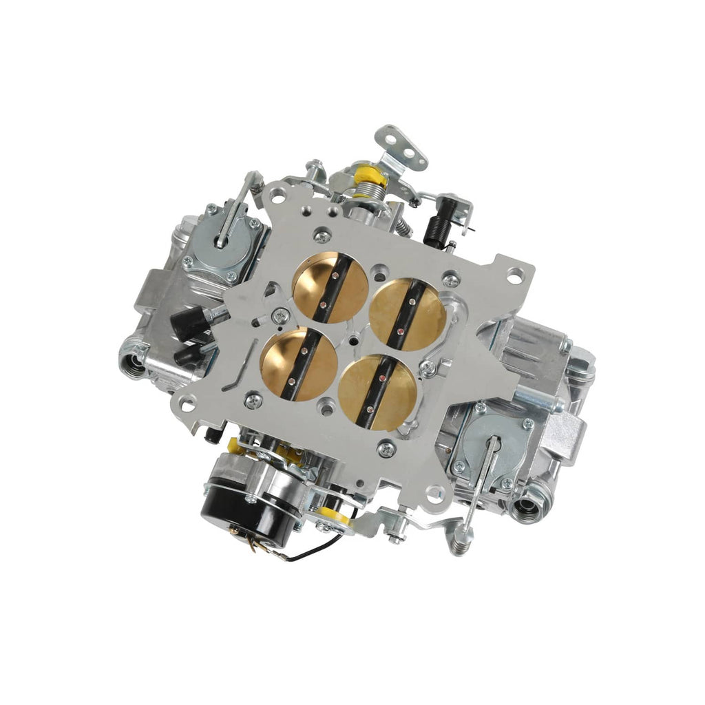 Three-quarter view of 4-barrel carburetor with four gold throttle bores
