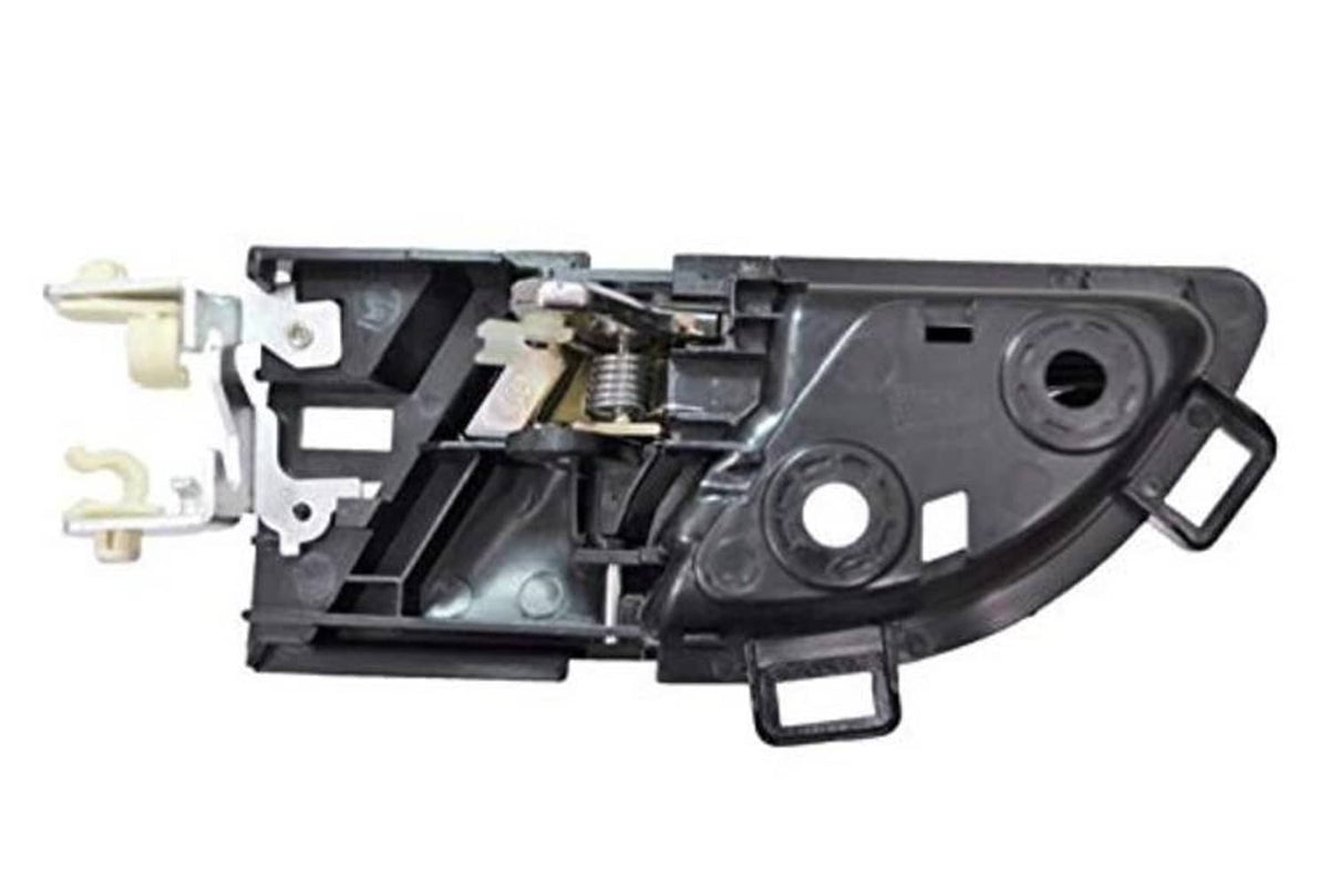 Interior door handle housing, side view with exposed latch mechanism and mounting clips