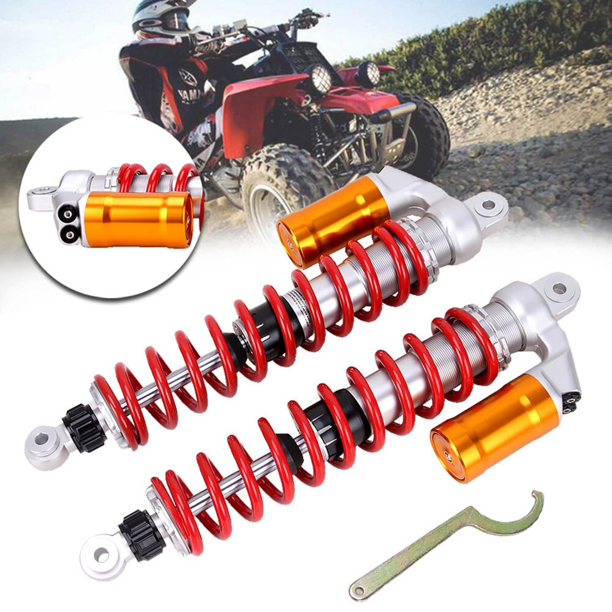 Front shock absorber pair with red springs, orange-gold reservoirs, silver housings