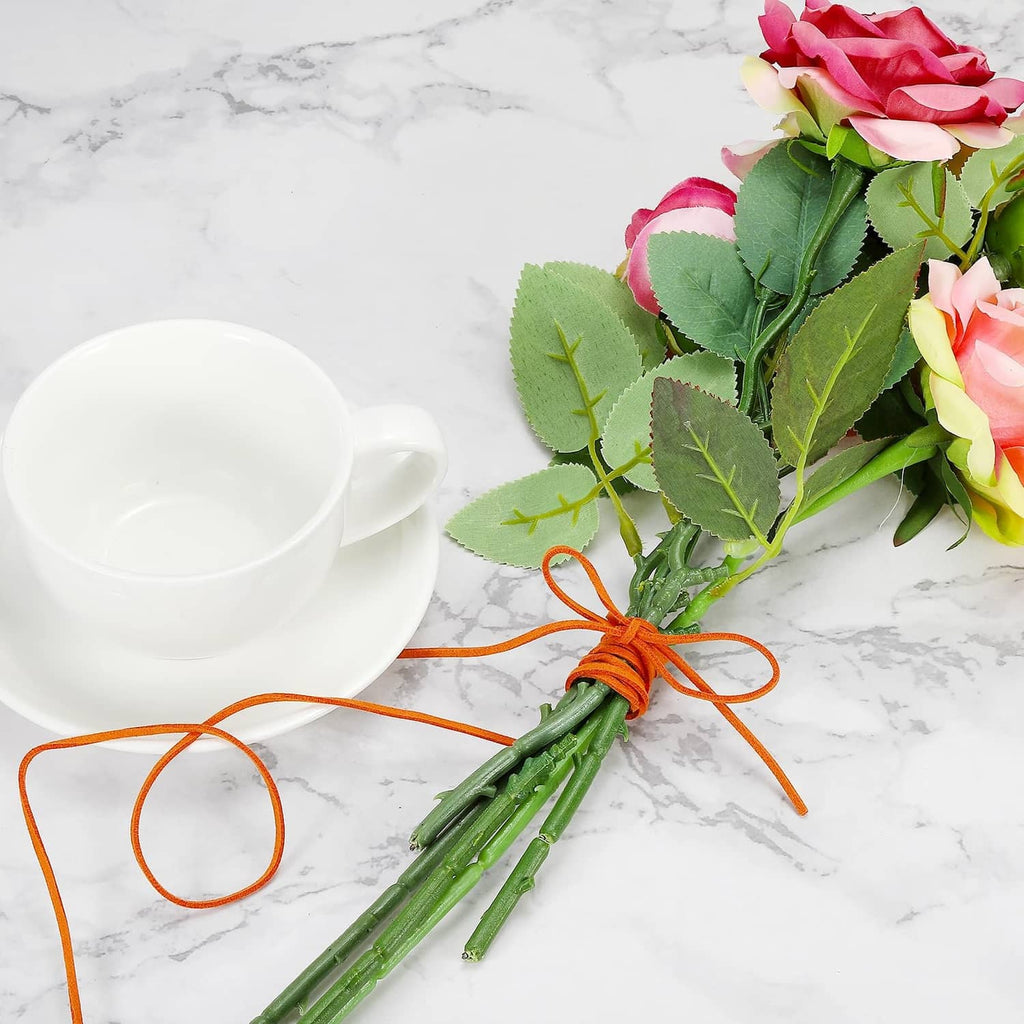 Faux suede leather cord strands tied on floral stems