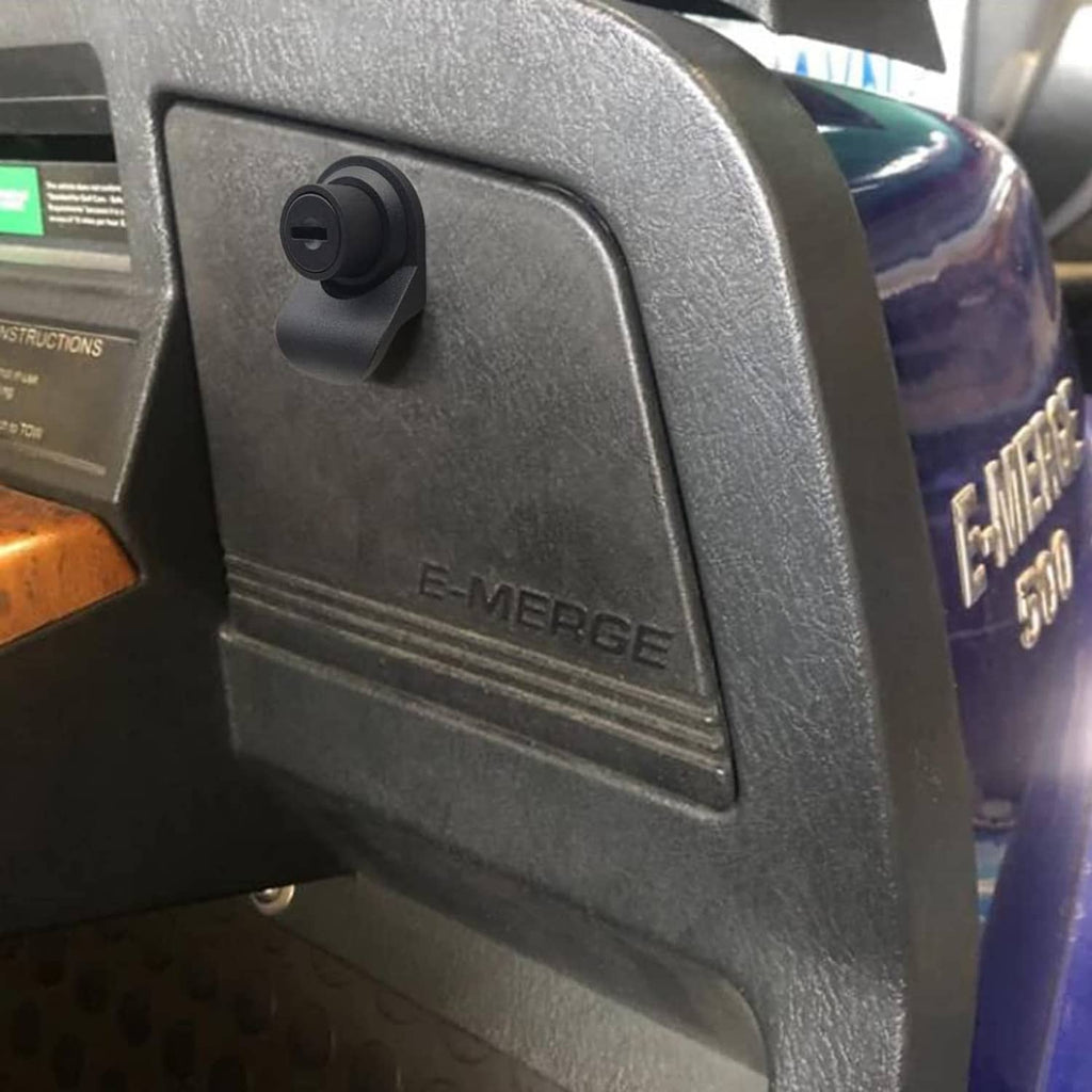 Black glove box latch installed on vehicle dashboard with E-MERGE text