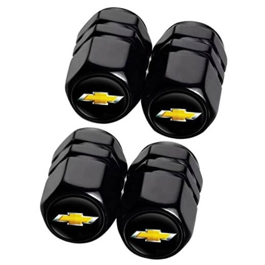 Set of four black tire valve stem caps with gold Chevrolet bowtie logo