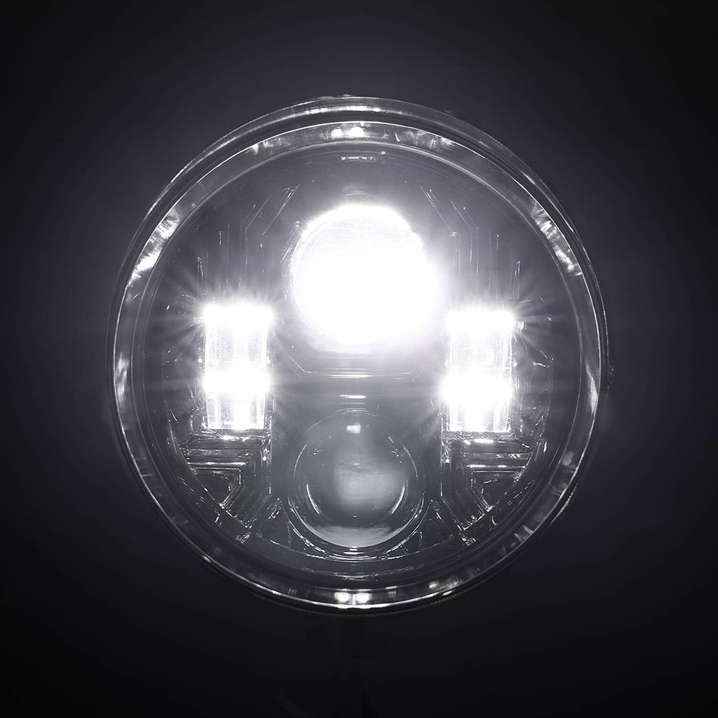 Lit LED bullet headlight with bright white center and multi-lamp pattern