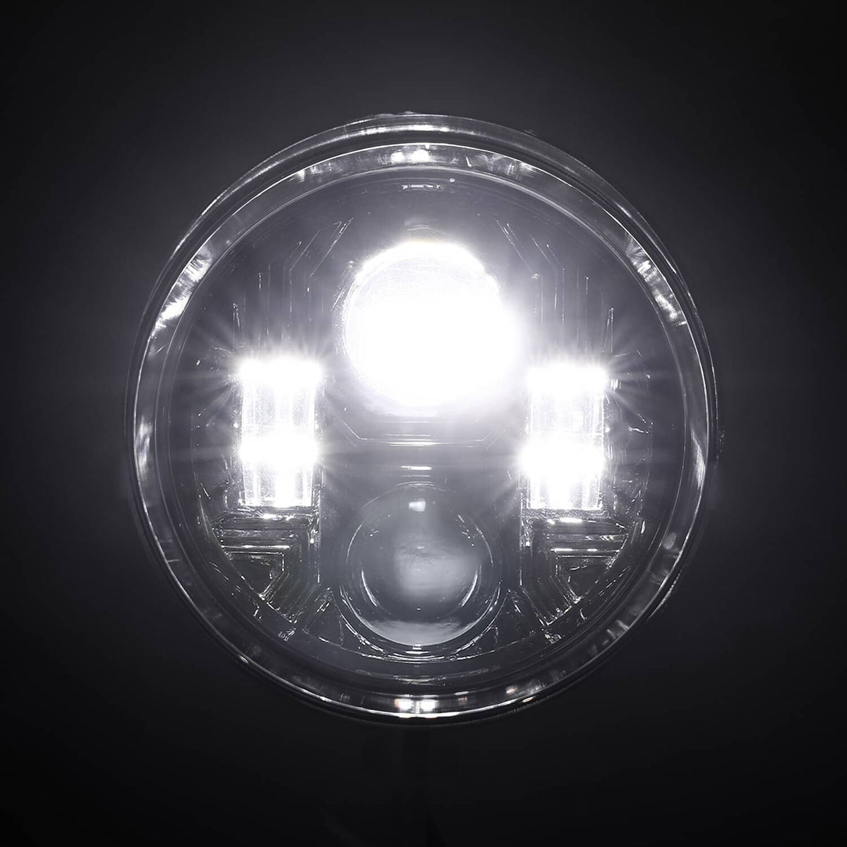 Lit LED bullet headlight with bright white center and multi-lamp pattern