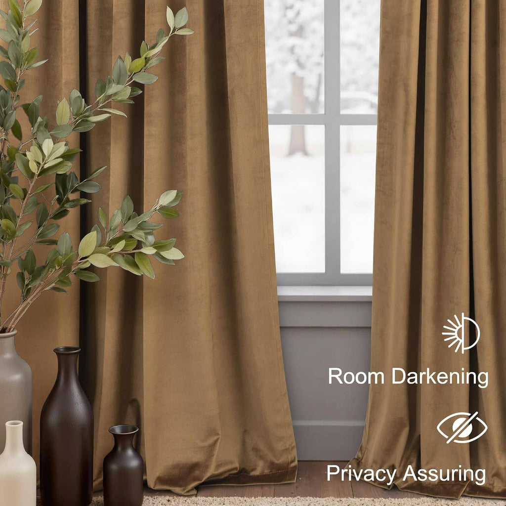 Gold brown velvet curtain panel partially open beside a window.