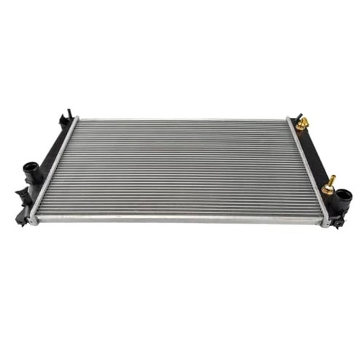 Auto radiator lying flat with silver fin core and visible inlet/outlet fittings.