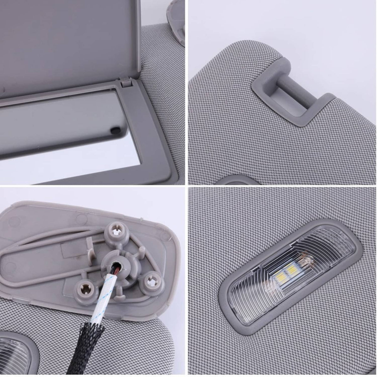 Grey sun visor close-up showing handle cutout, LED light lens, and internal wiring