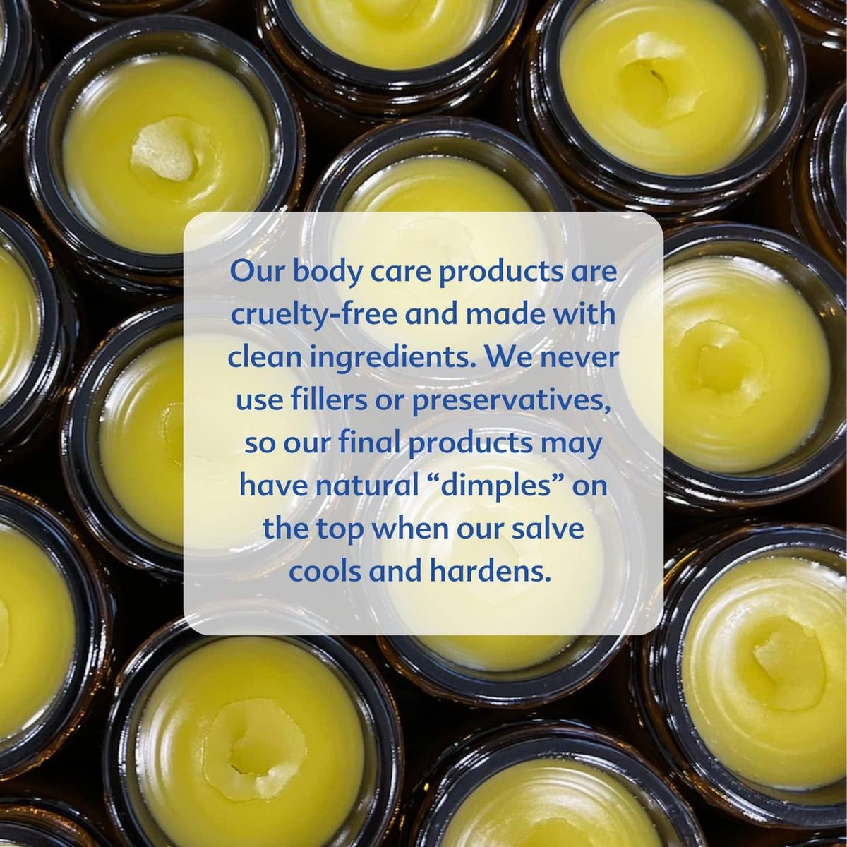Multiple Motherlove diaper balm jars with yellow balm and black screw lids