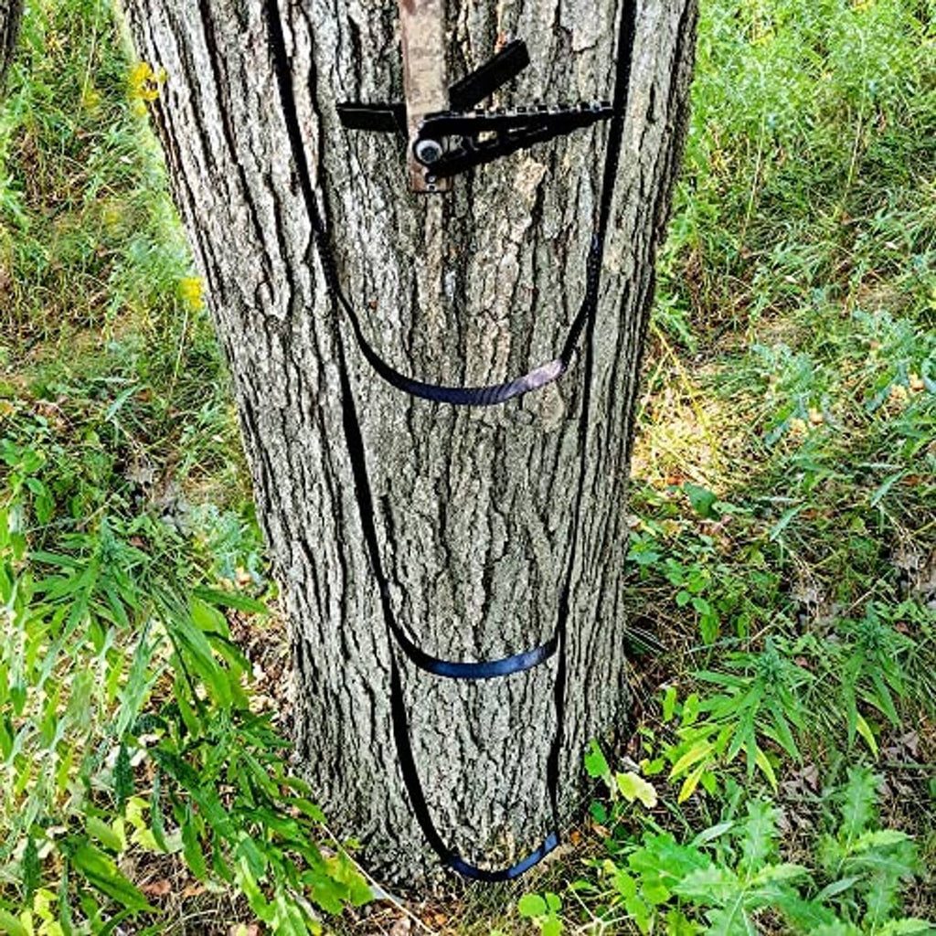 HANG N' BANG climbing aider with dark straps and three padded step bars on a tree