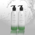 Thickening shampoo and conditioner set with two pump bottles, black caps and green labels