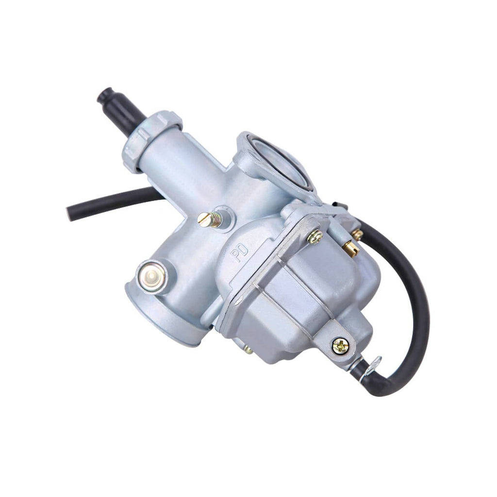 Light gray carburetor with round choke housing, black fuel hose, and brass screws