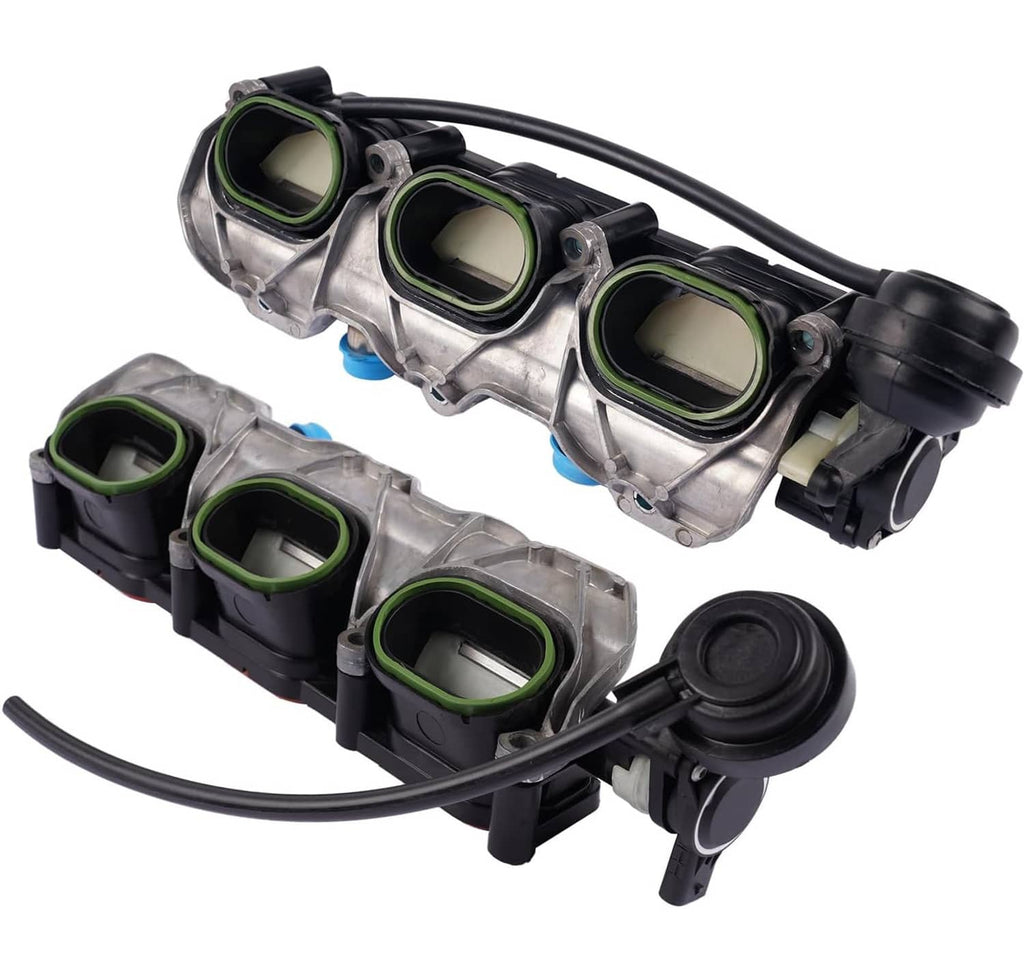 Intake manifold pair angled view; silver runners with green ports, black covers, curved hoses