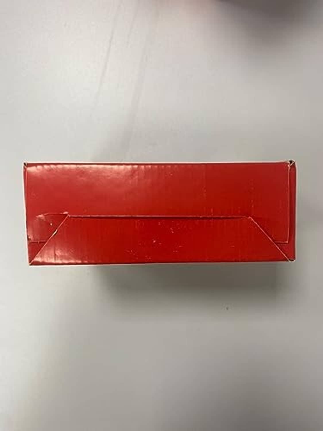 Red cardboard shipping box for wireless game controller