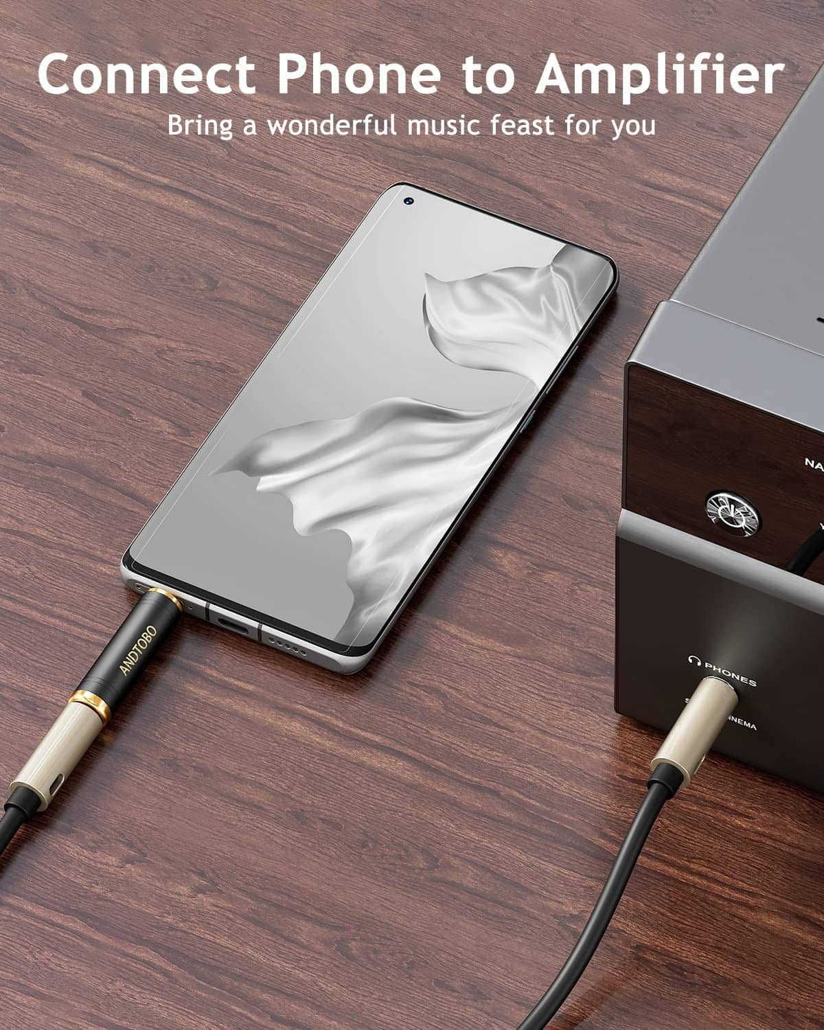 Stereo audio adapter connecting phone to amplifier, 3.5mm plug to 1/4in port, gold tips