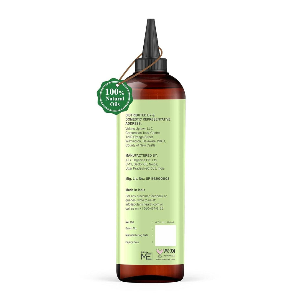 Botanic Hearth rosemary & batana hair oil bottle back label with safety and manufacturing info