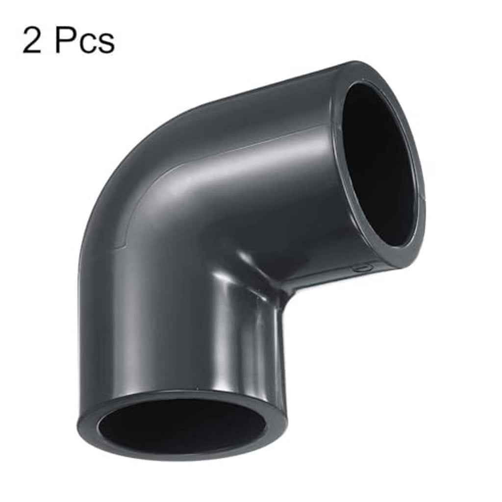 Two-pack dark gray 90-degree PVC elbow corner fittings, 1-inch, close-up angle view
