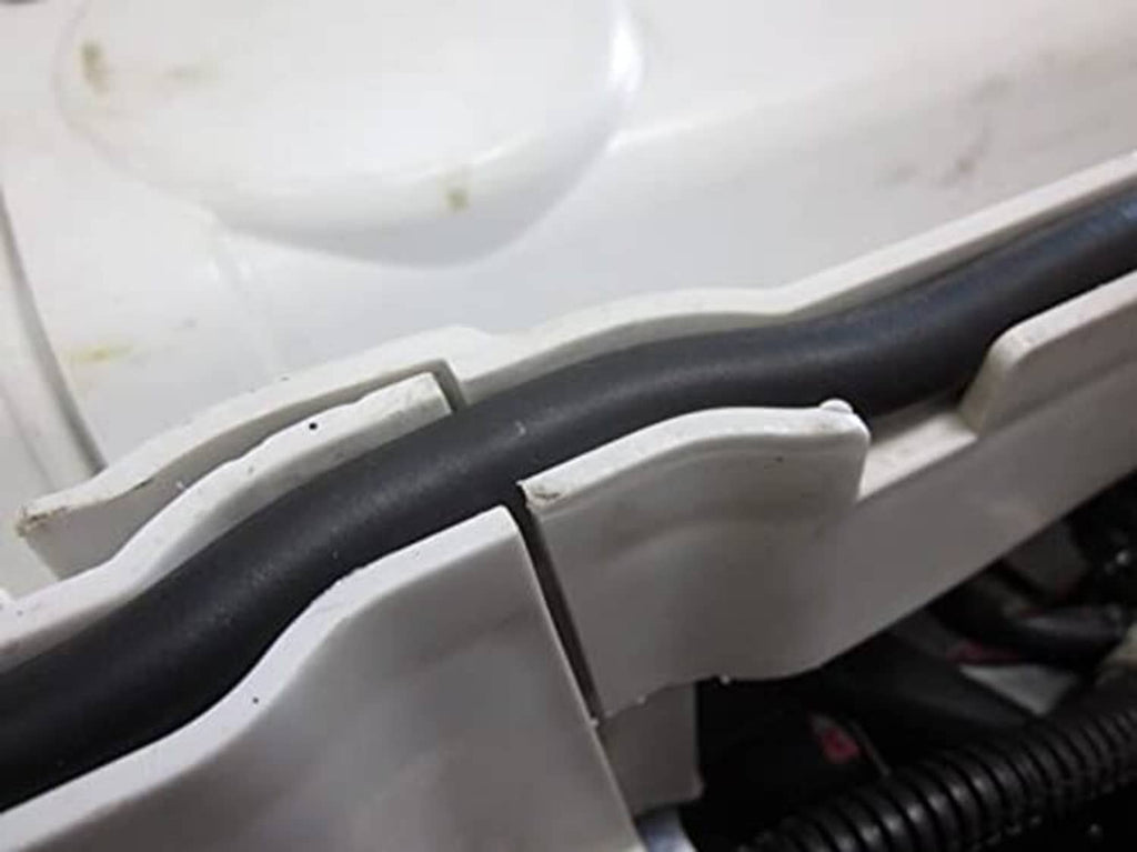 Black rubber gasket seal detail on front rack storage compartment edge