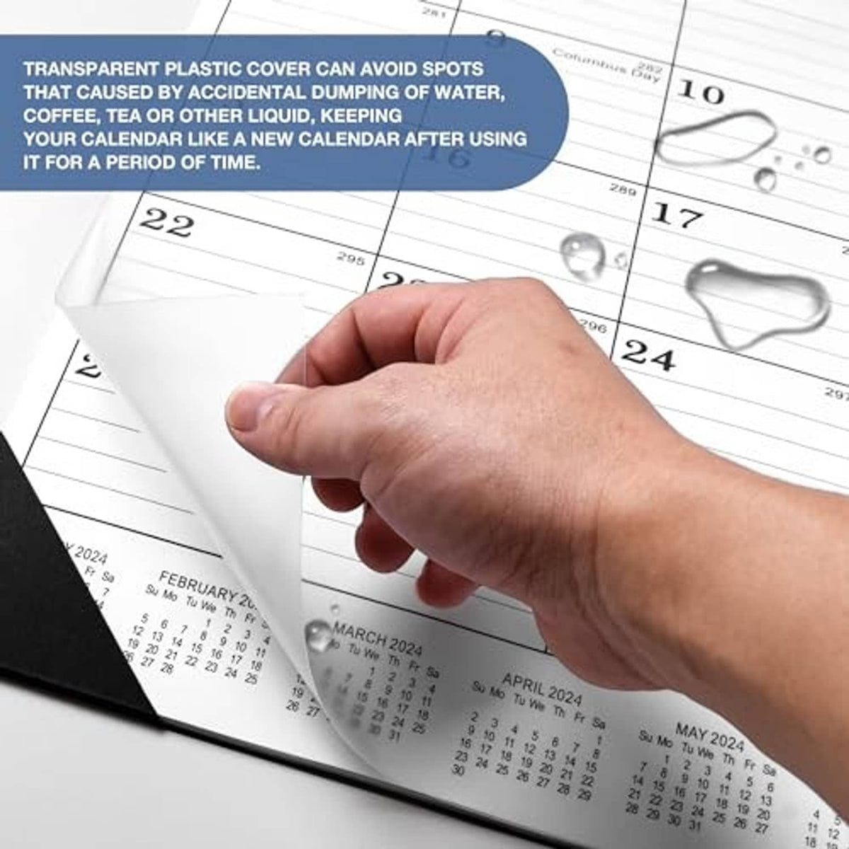 Hand pressing a clear plastic-covered desk calendar sheet over the date grid