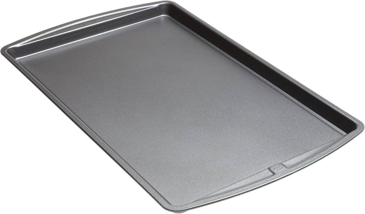Gray nonstick baking sheet tray with sloped sides and smooth coating