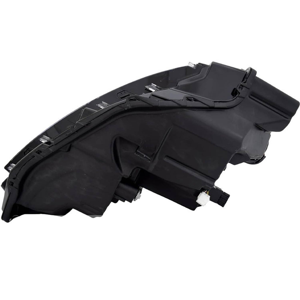 Back housing side of a black LED headlight assembly with electrical terminals.