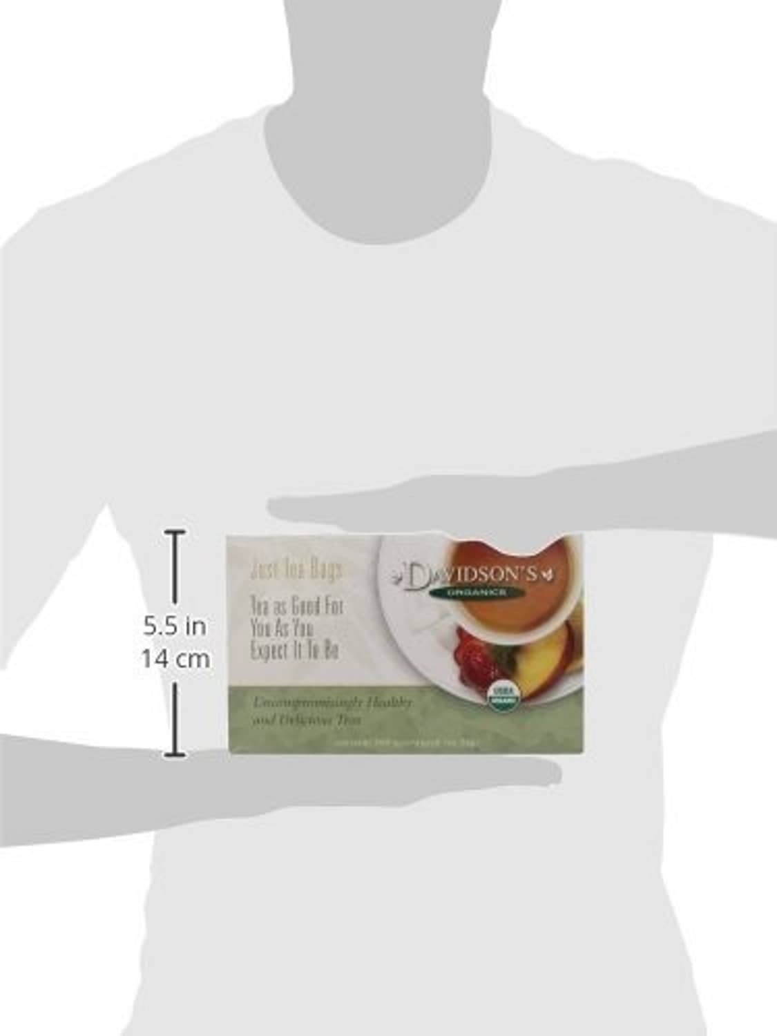 Organic tea bag carton held in hand with 5.5 in (14 cm) size marker