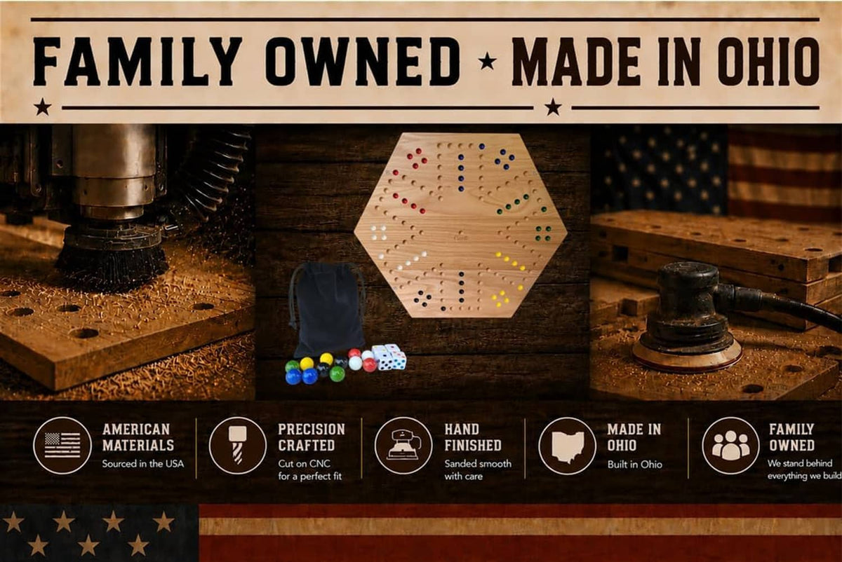 Hex board game on a workbench with marbles, dice, and a wooden playing surface