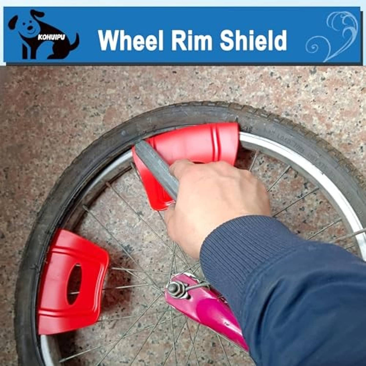 Red rim shields installed on wheel rim with oval cutouts for tire replacement.