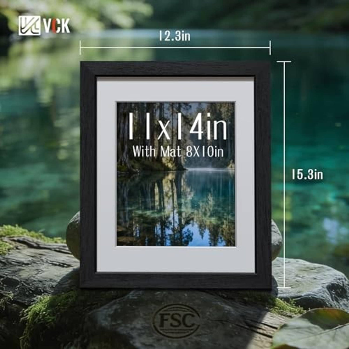 Black wood 11x14 picture frame with white mat on a stone surface