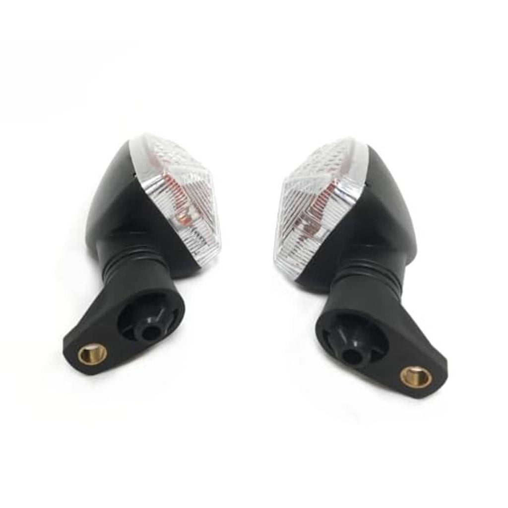 Two motorcycle turn signal lights showing black mounting bases with gold pins, clear top lens