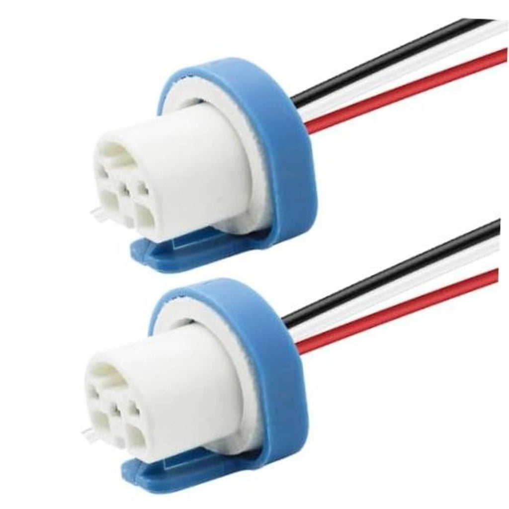 Two 3-pin headlight wiring harness connectors with blue clips and white ceramic sockets