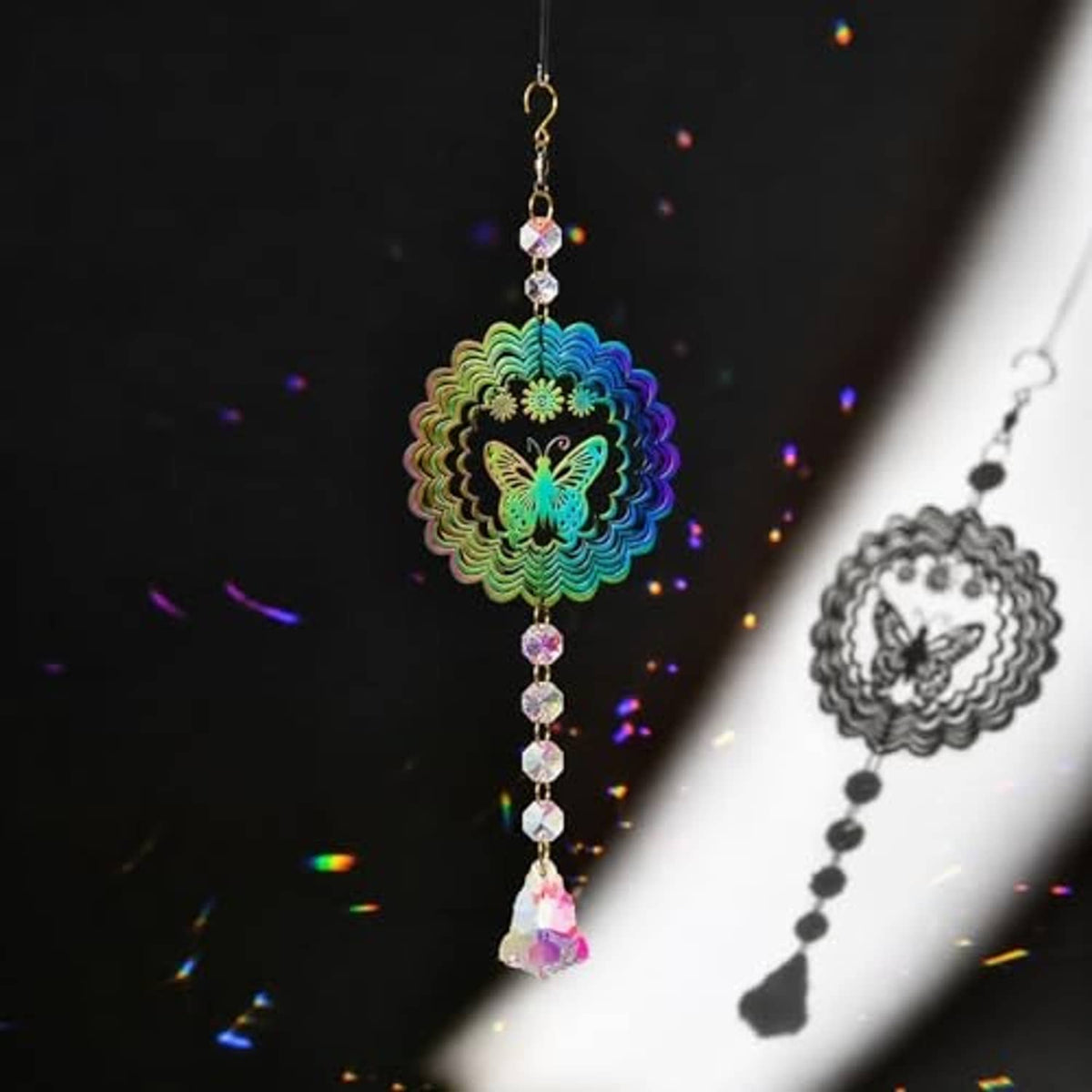 Butterfly crystal suncatcher wind spinner with multicolor beads creating light speckles