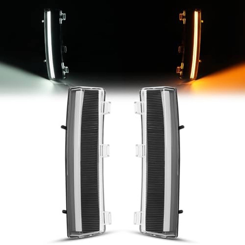 Pair turn signal lights with clear lens and black housings, illuminated bars visible