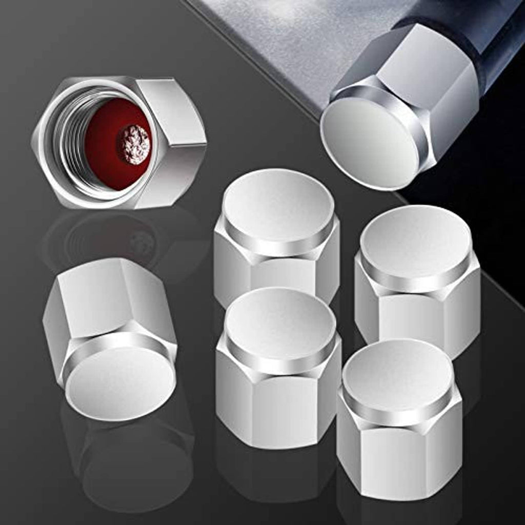 Chrome tire valve stem caps with red insert shown in an open cap