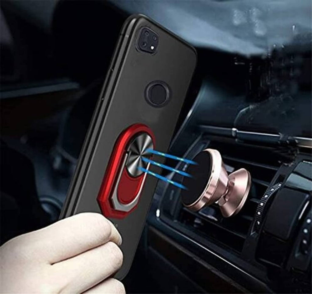 Black phone case with red ring kickstand attached to car mount in a close-up