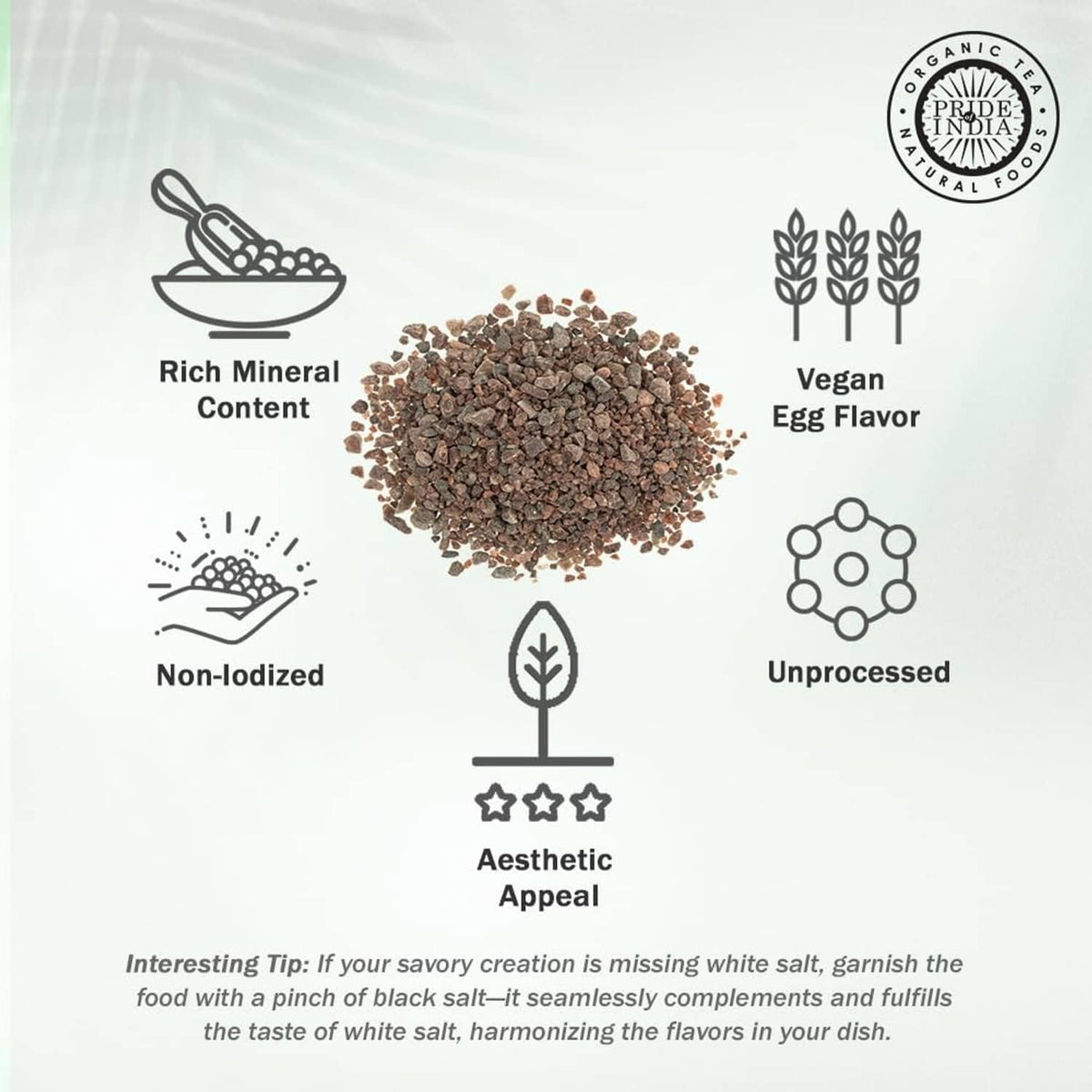 Mound of dark black salt crystals with icons for mineral content, vegan egg flavor, unprocessed