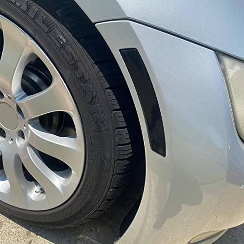 Installed smoked fender bumper reflector on a car fender with black mounting panel