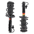 Front strut assembly pair with black coil springs and electronic sensor connectors