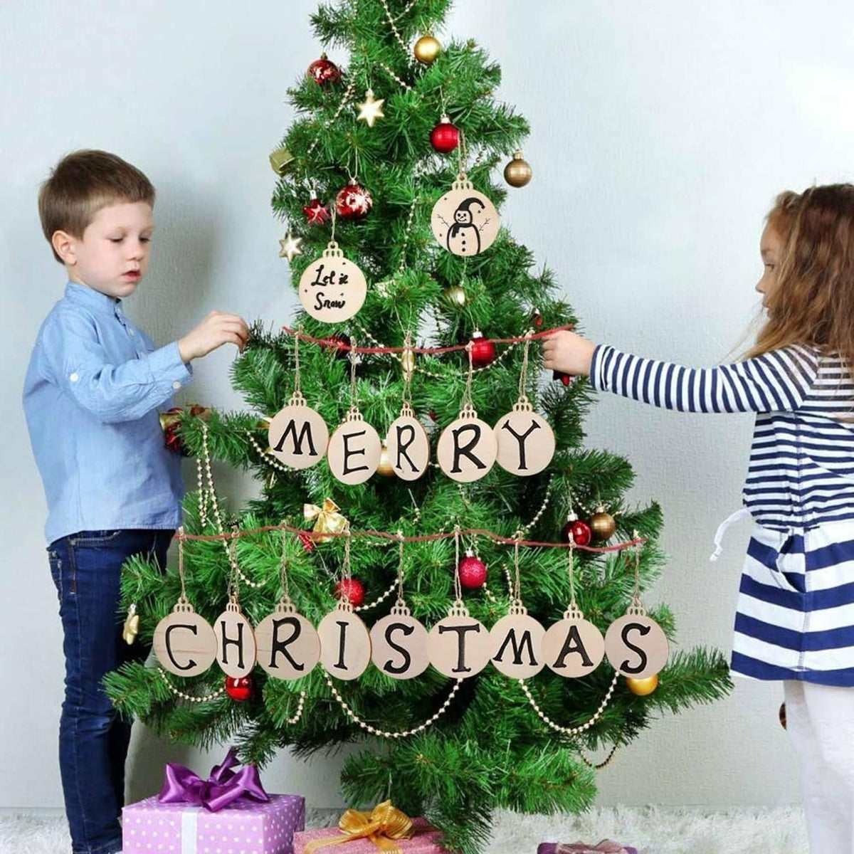 Christmas tree decorated with round wooden hanging ornaments