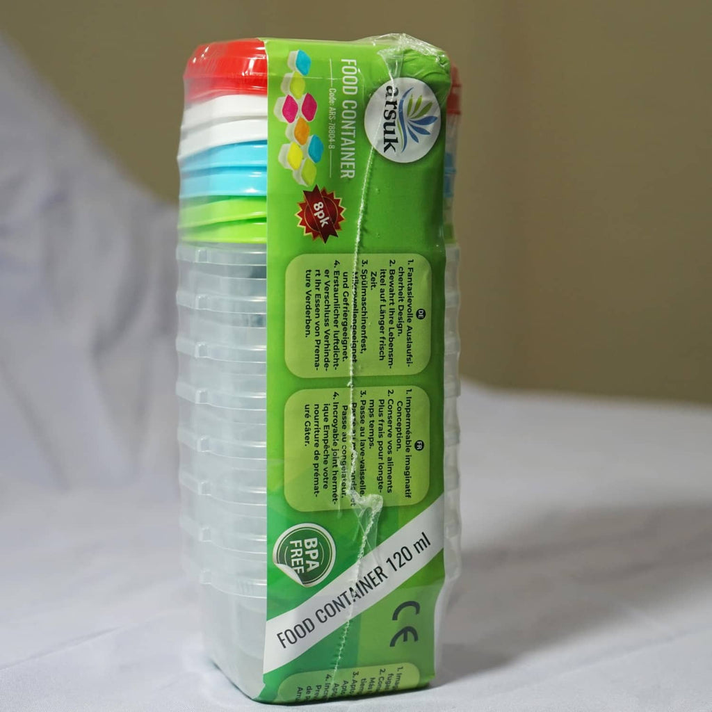 Stacked 120ml baby food containers with green lid and clear sides