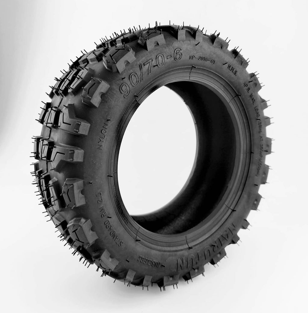 10-inch off-road tubeless tire with rugged tread and raised side knobs