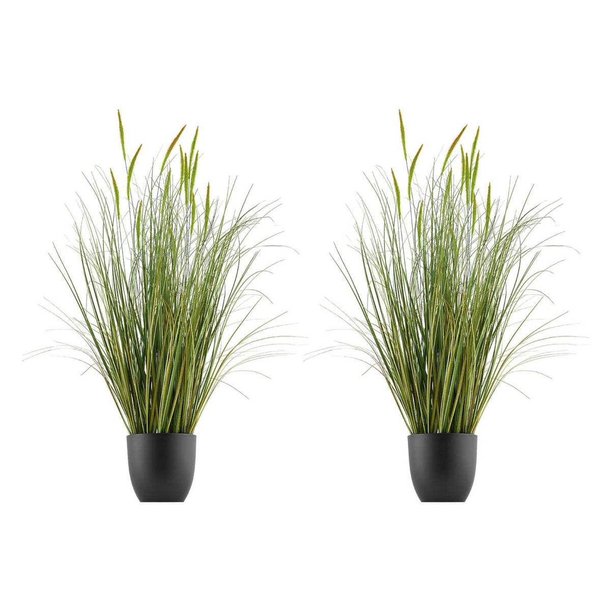 Two potted artificial cattail grass plants with upright green blades in black pots