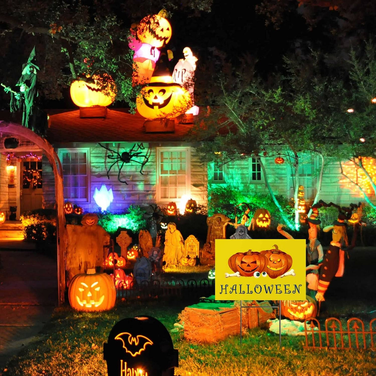 Yellow Halloween yard sign panel on stakes with jack-o-lantern graphic
