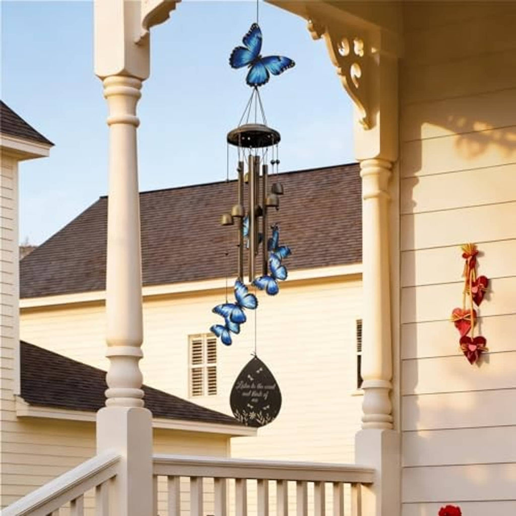 Blue butterfly metal wind chime with black tubes and hanging floral tag