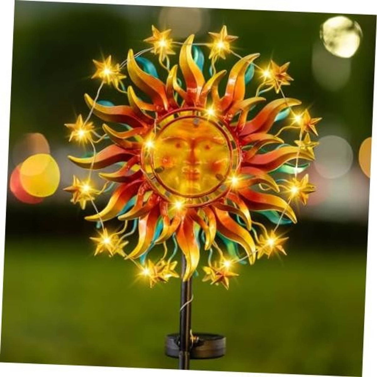 Solar metal sun wind spinner with colorful sunface and glowing star accents on pole.