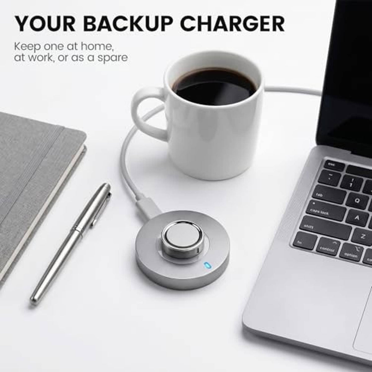 Smart ring charger dock on desk with blue indicator, gray base and USB-C cable