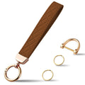 Brown quilted leather keychain strap with gold key rings and snap hook