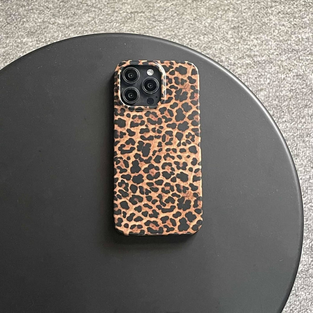 Brown leopard print phone case, back view with four-lens camera openings