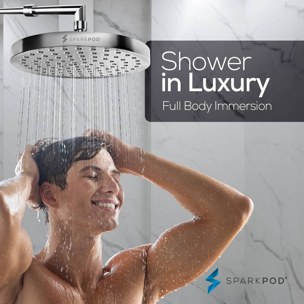 Polished chrome rain shower head releasing full-body spray from overhead face