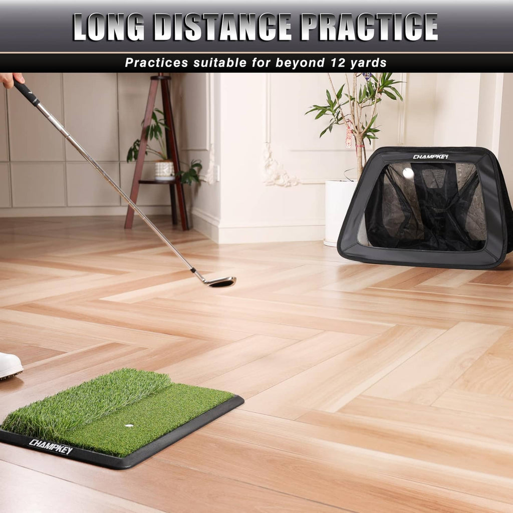 Black golf chipping net for long-distance practice with practice mat on floor