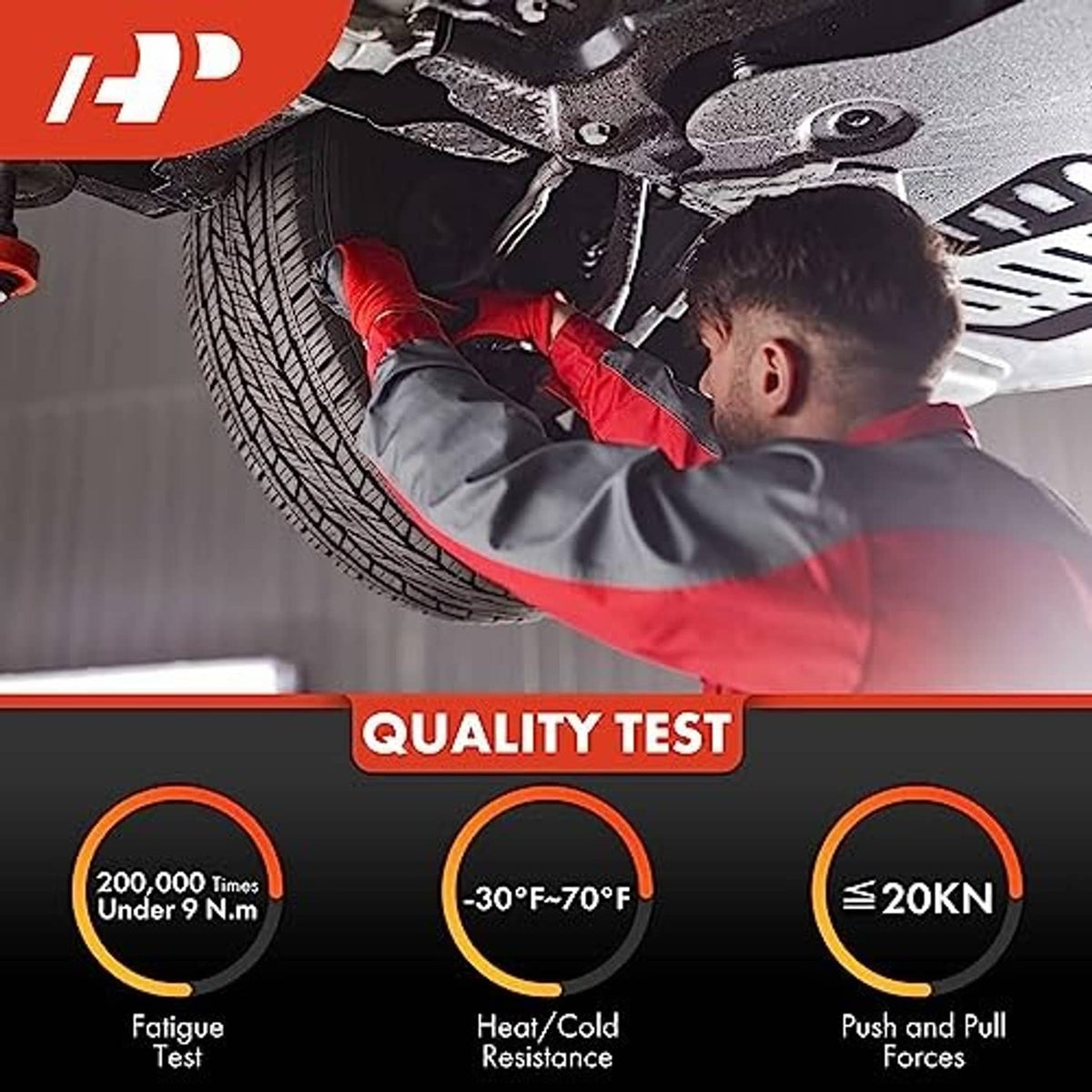 Mechanic installing a front ball joint under the vehicle near the wheel